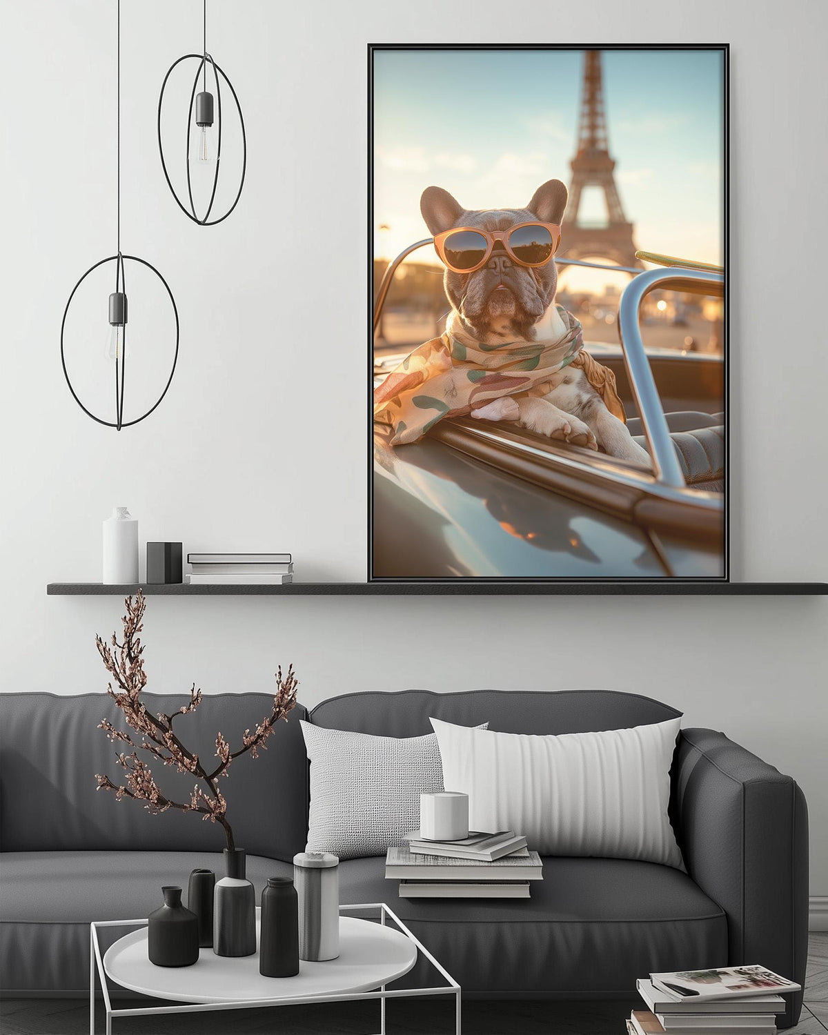 A framed photograph of a French Bulldog wearing sunglasses and sitting in a car, with the Eiffel Tower visible in the background.