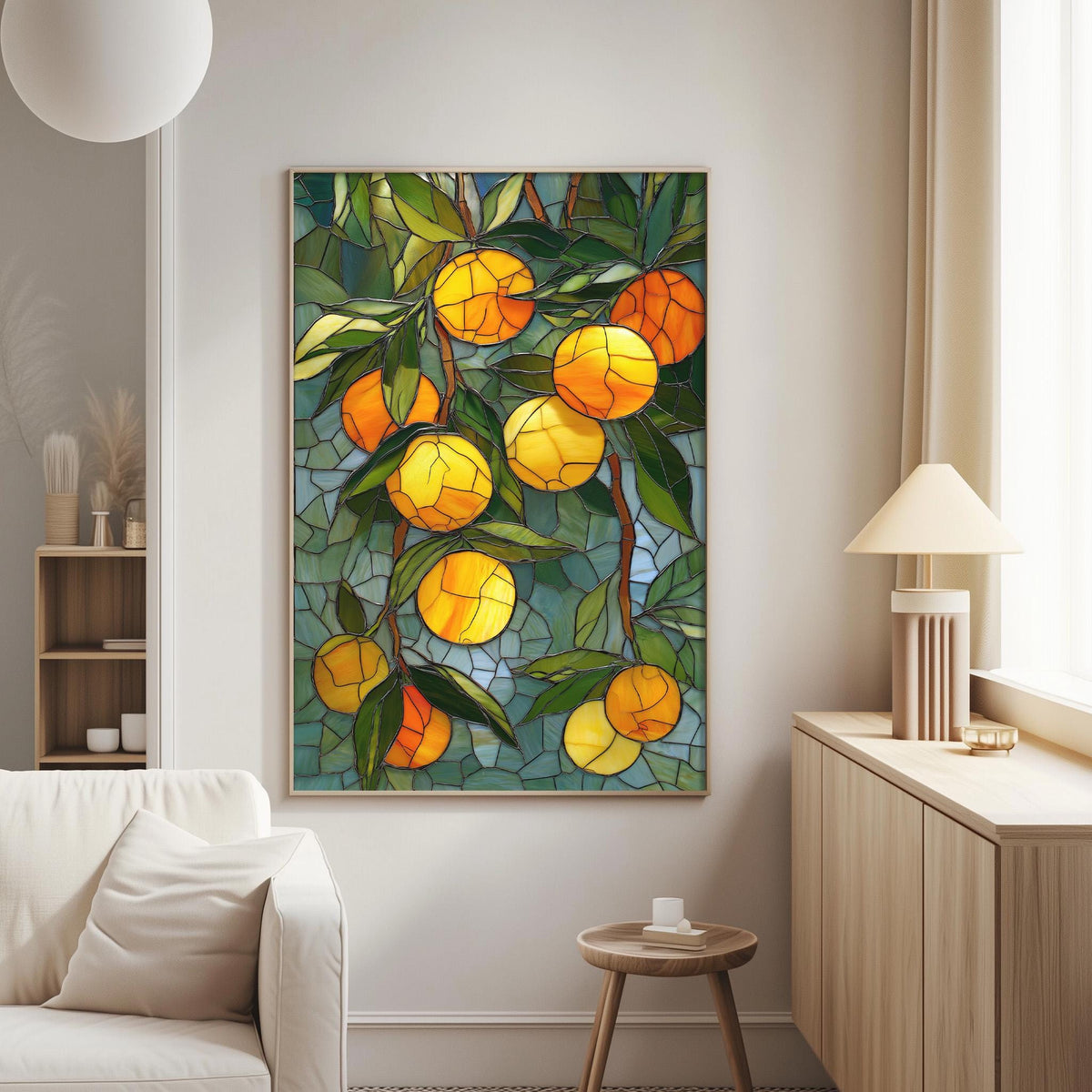 a large, colorful stained glass artwork depicting a vibrant scene of oranges hanging from a tree. The artwork is mounted on a wall in a living room setting, with a white couch and a wooden side table visible in the background.