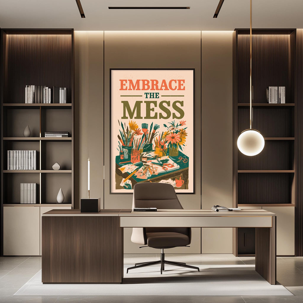 a modern office space with a desk, chair, and shelving units. A large poster with the text "Embrace the mess" is displayed on the wall above the desk.