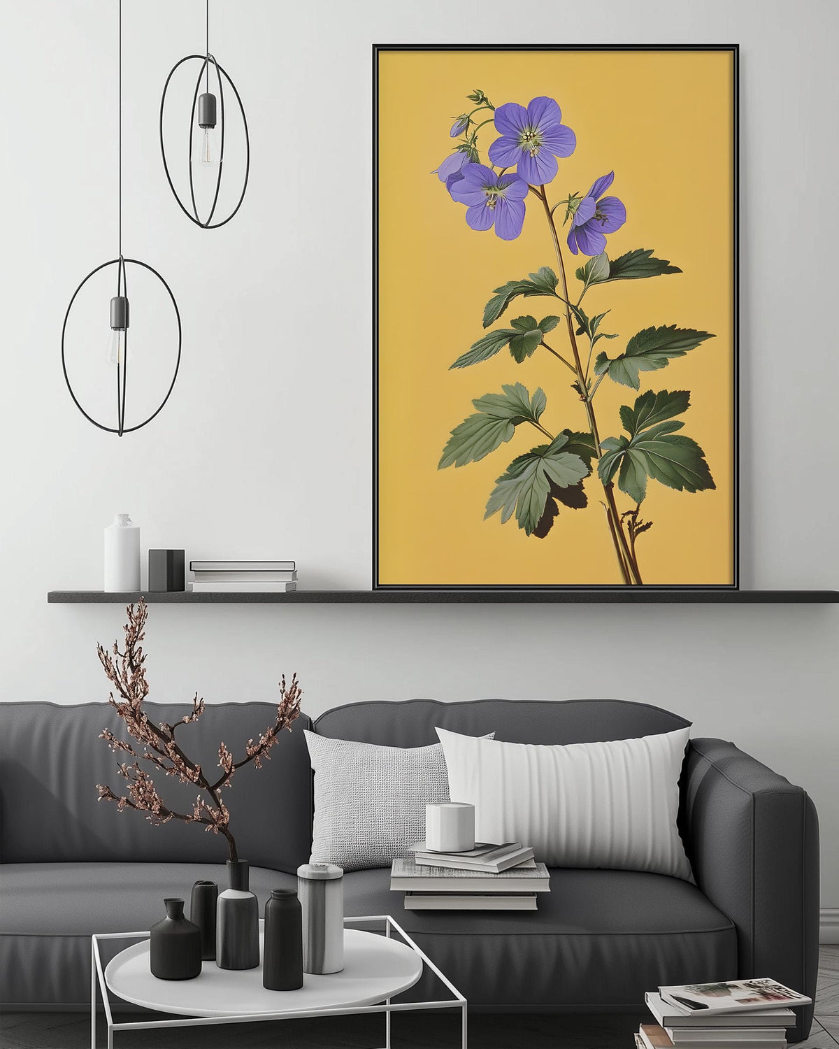 a living room with a gray sofa, a coffee table, and a large framed print of a purple flower on the wall above the sofa.