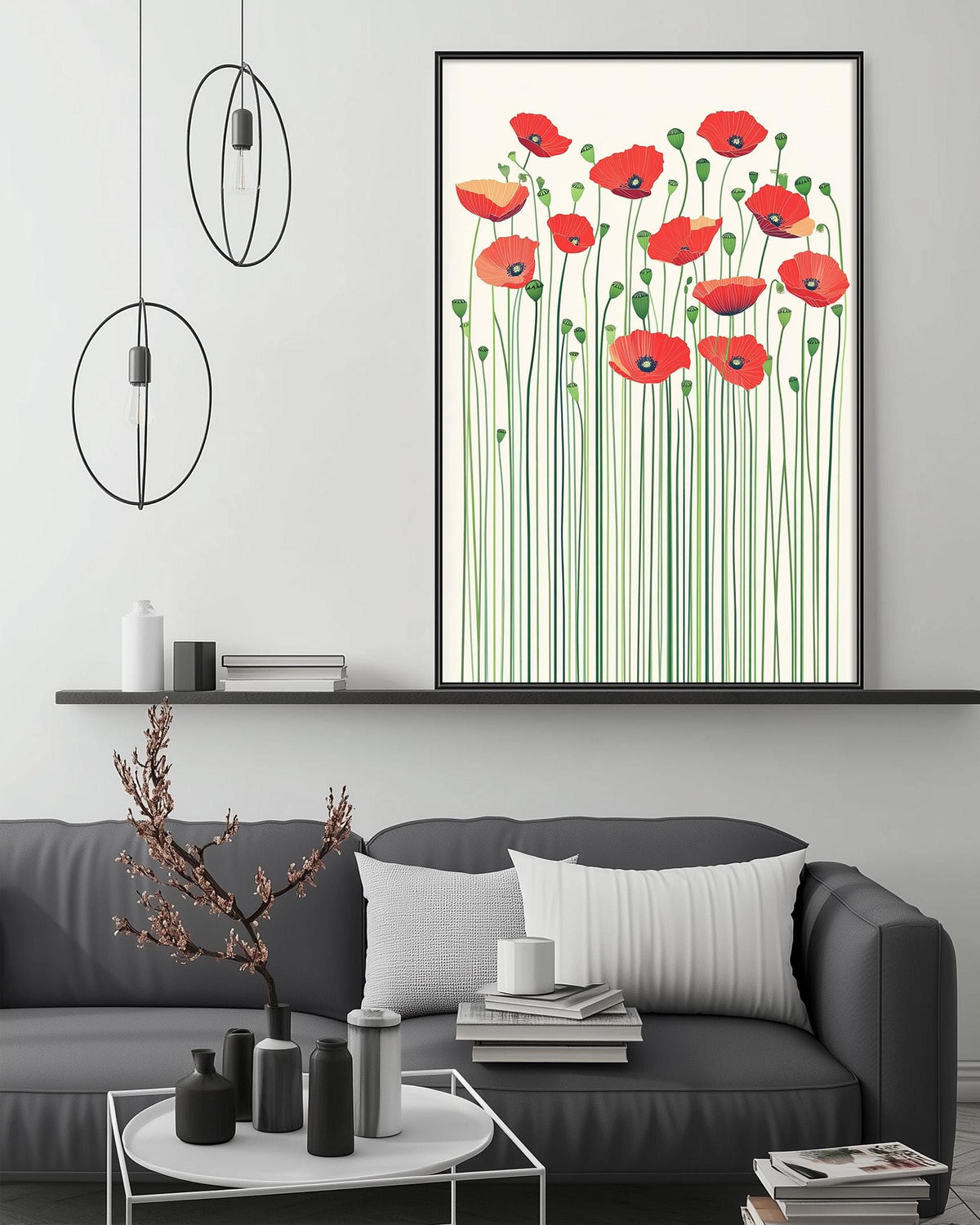 a modern living room with a gray sofa, a coffee table, and a large framed print of red flowers on the wall.