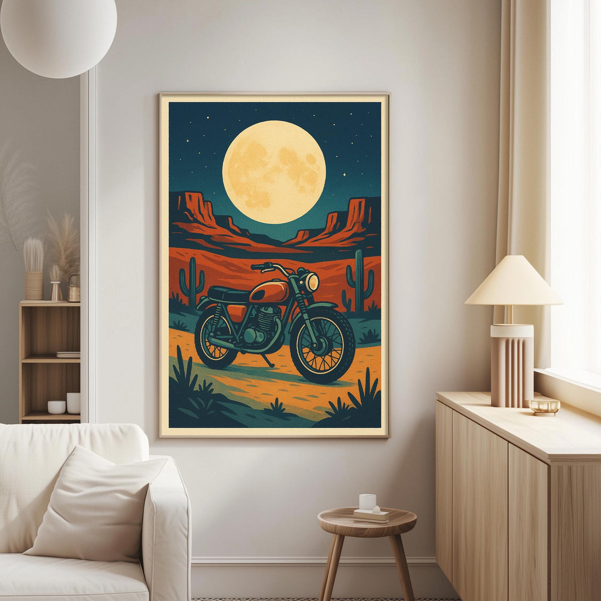 a large framed poster of a motorcycle on a desert landscape, with a full moon in the background.