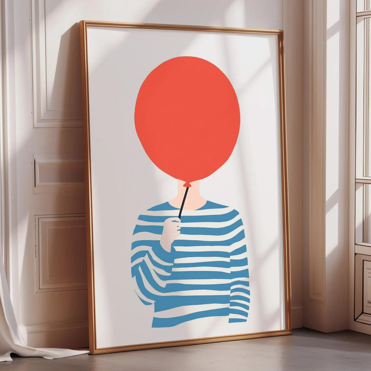 a framed illustration of a person holding a red balloon.