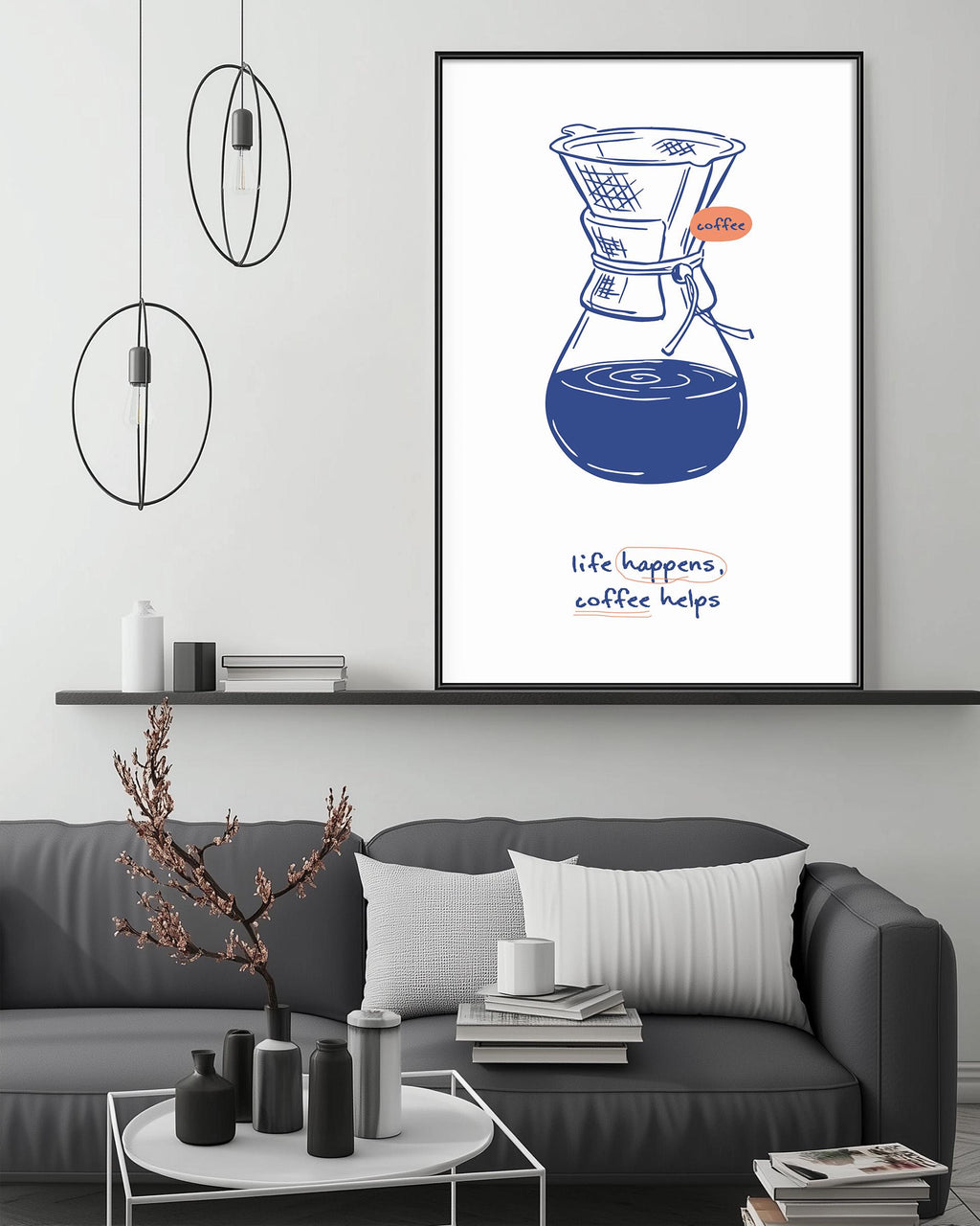 a cozy living room with a gray couch, a coffee table with decorative items, and a framed poster of a coffee maker on the wall.