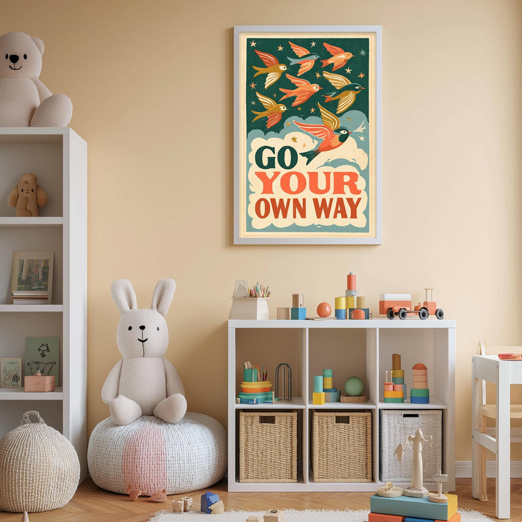 A child's bedroom with a white bookshelf, a stuffed rabbit, and a colorful poster on the wall. The poster features a bird illustration and the text "GO YOUR OWN WAY".