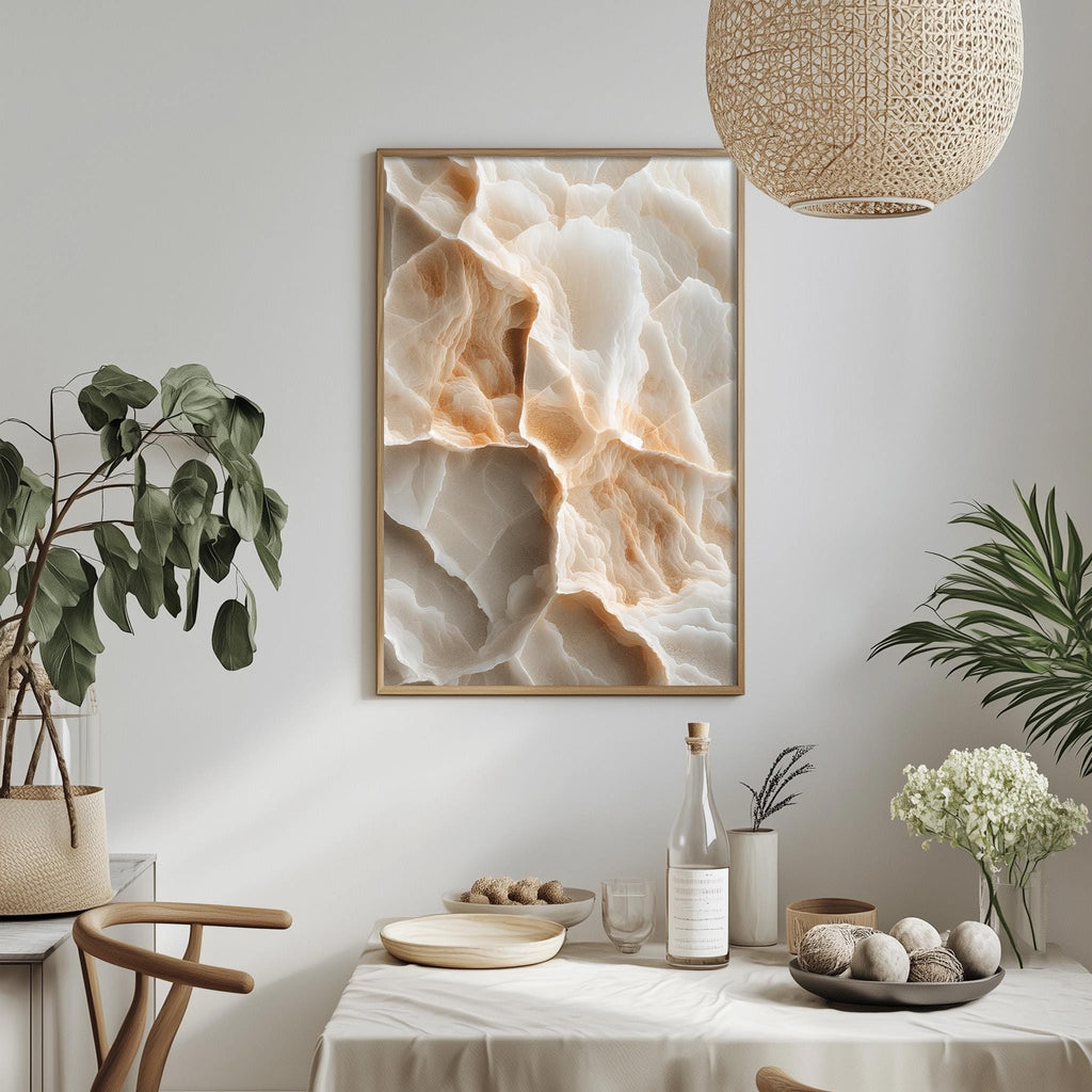 a dining room with a table set for a meal, a potted plant, a hanging light fixture, and a framed abstract painting on the wall.