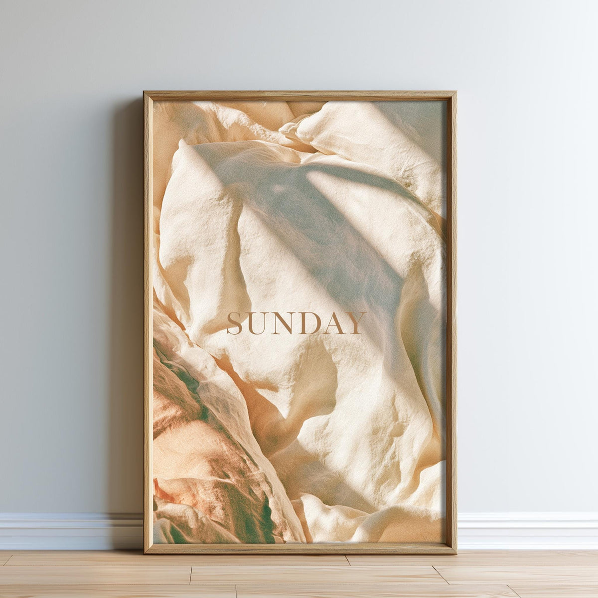 The image is a framed print with a textured, crumpled beige fabric.