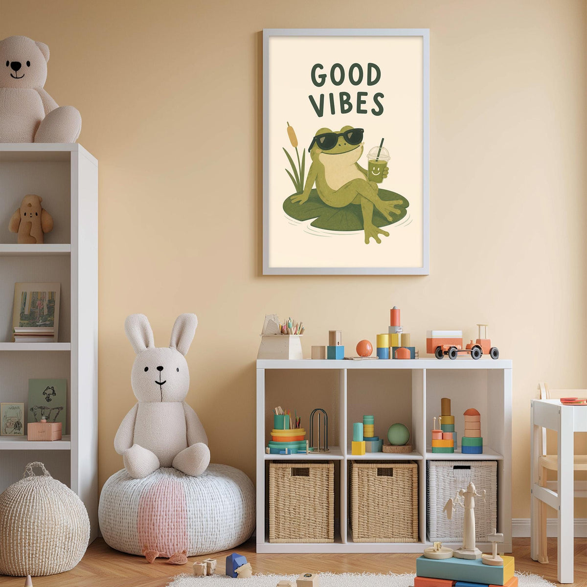 A child's bedroom with a white bookshelf, a stuffed rabbit, and a framed poster featuring a frog wearing sunglasses and holding a drink.