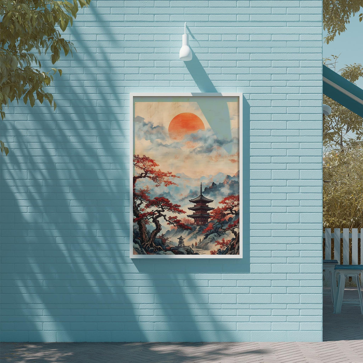 a large, framed painting of a serene landscape with a pagoda in the background, set against a backdrop of a cloudy sky and trees.