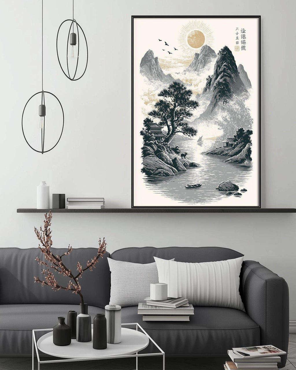 a living room with a gray sofa, a coffee table, and a large framed landscape painting hanging on the wall above the sofa.