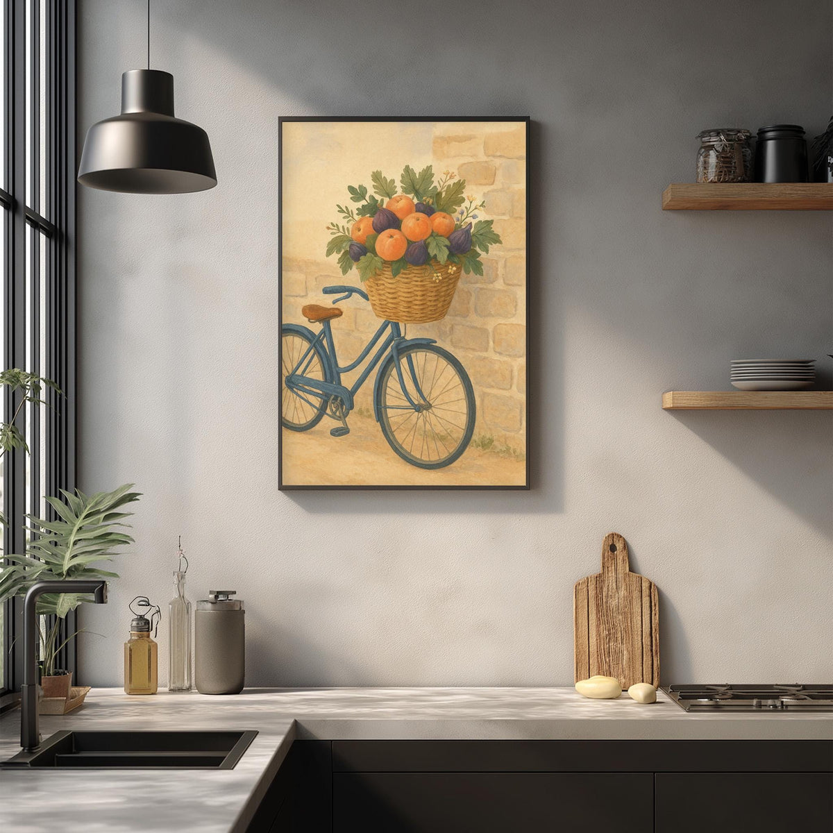 a kitchen counter with a framed painting of a bicycle with a basket of fruit hanging on the wall above it.