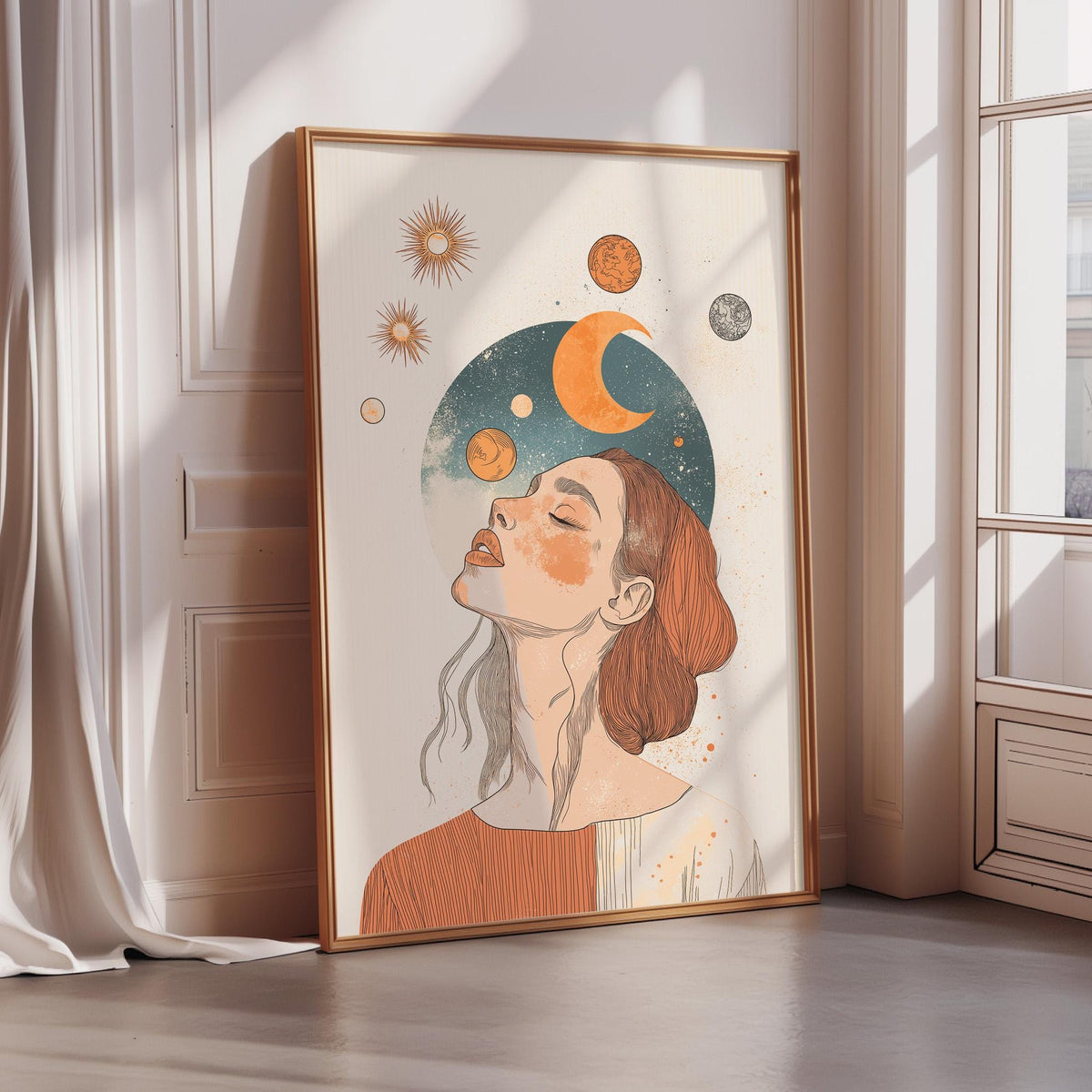 a framed illustration of a woman with her eyes closed, surrounded by celestial elements such as suns, crescents, and planets.
