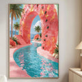 a vibrant and colorful painting of a tropical pool area, with a pink archway leading to a pool surrounded by palm trees and other tropical foliage. The painting is hung on a wall in a living room setting, with a white couch and a wooden side table visible in the background.