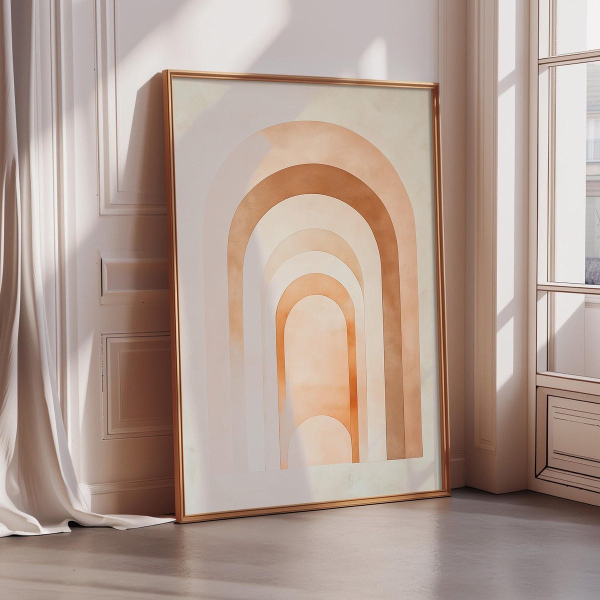 a large, framed artwork with a geometric design of arches in shades of orange and white. The artwork is leaning against a wall, and there is a curtain visible in the background.