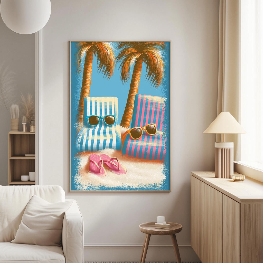a vibrant beach scene with two lounge chairs, one blue and one pink, positioned on a sandy beach with a pair of flip flops nearby. The chairs are adorned with sunglasses, adding a playful touch to the scene. The image is framed and hung on a wall, creating a cheerful and relaxing atmosphere in the living room.