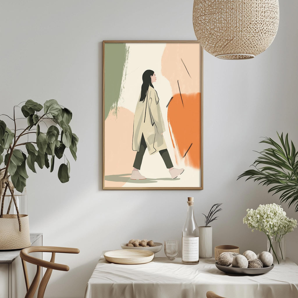 a framed illustration of a woman walking in a beige coat, hanging on a wall above a dining table with various decorative items and plants.