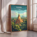 a poster of the Bagan temple complex in Myanmar, with a golden pagoda and lush greenery in the background.