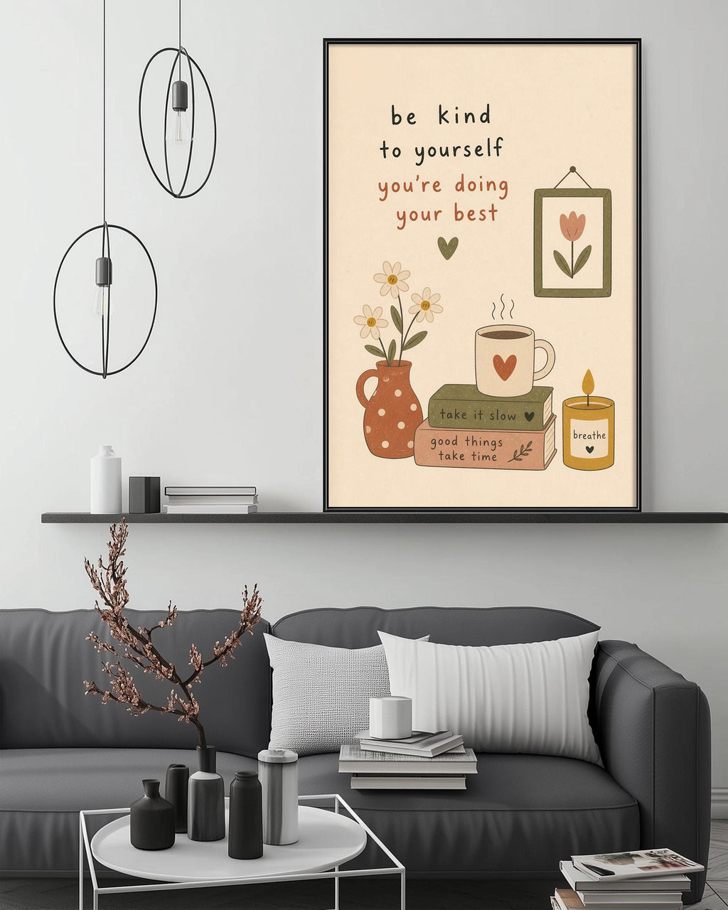 a cozy living room with a gray couch, a coffee table, and a framed poster with a motivational message.