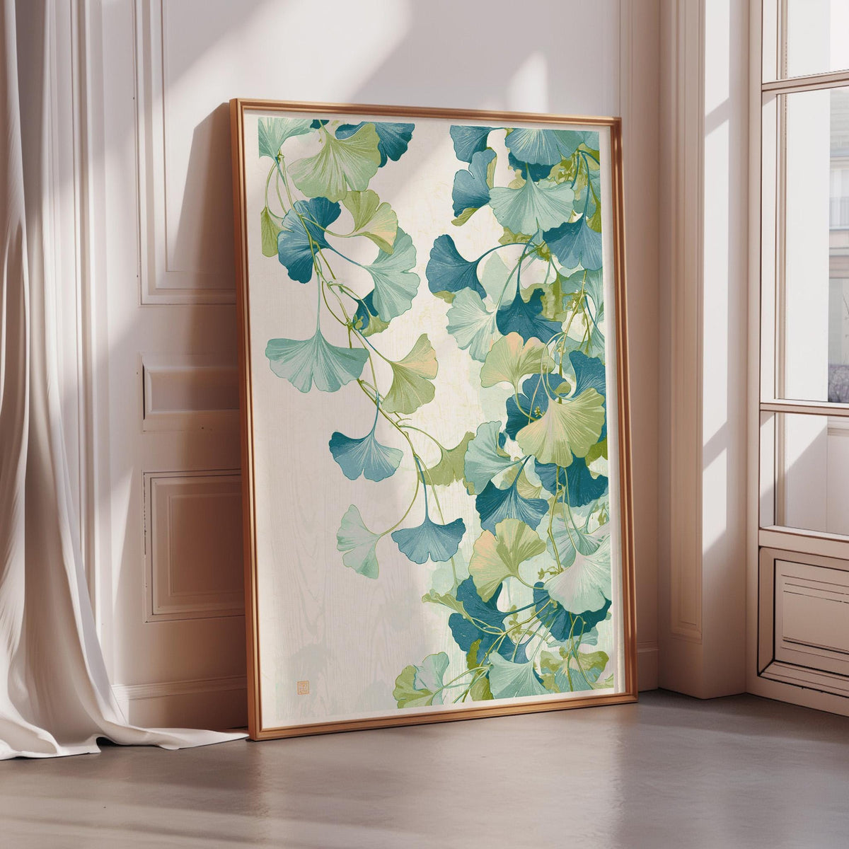 a large framed artwork depicting a lush, green plant with delicate, flowing leaves. The artwork is placed on a wooden floor in a room with a window, creating a serene and natural atmosphere.