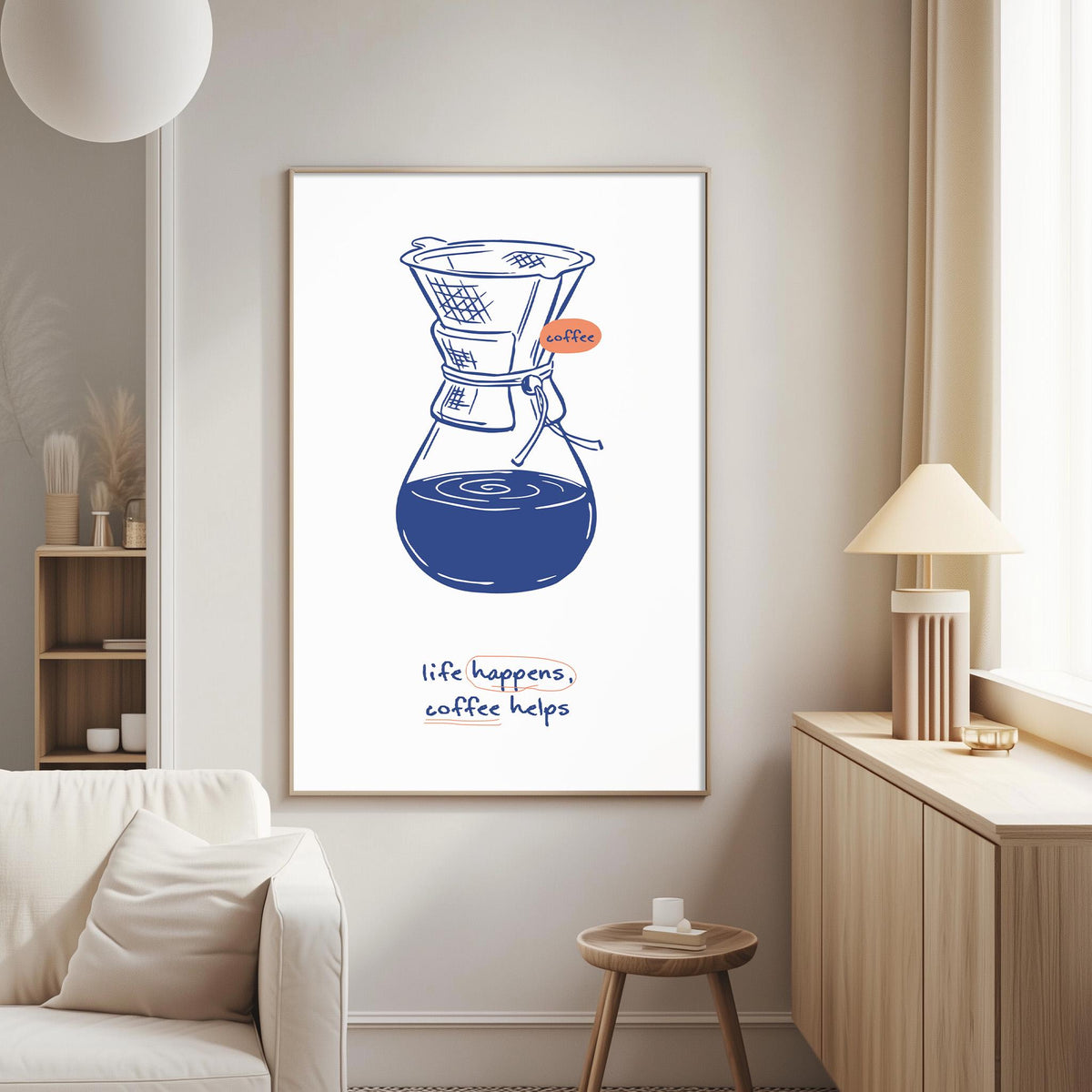 a living room with a white couch, a wooden side table, and a framed poster of a coffee maker on the wall.