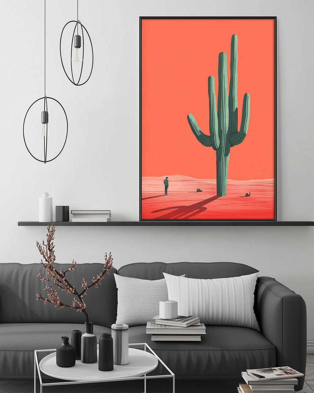 a modern living room with a gray sofa, a coffee table, and a large framed artwork depicting a desert scene with a cactus in the center.
