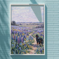 A framed painting of a dog standing in a field of flowers is displayed on a blue brick wall.