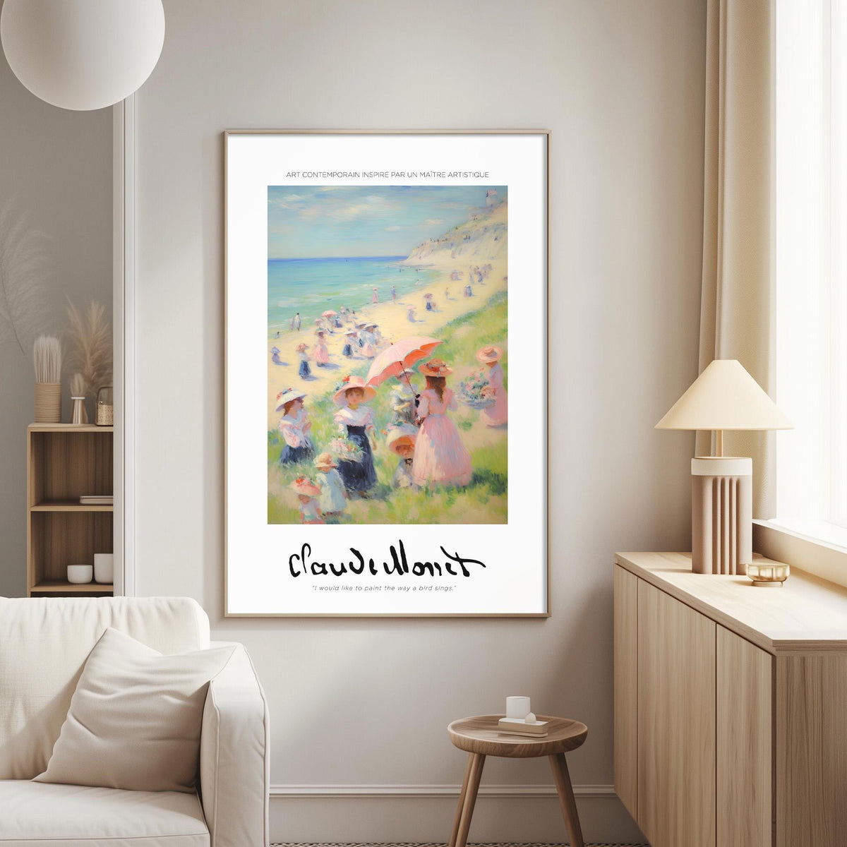 a large framed painting of a beach scene with people enjoying the day, hanging on a wall in a living room.
