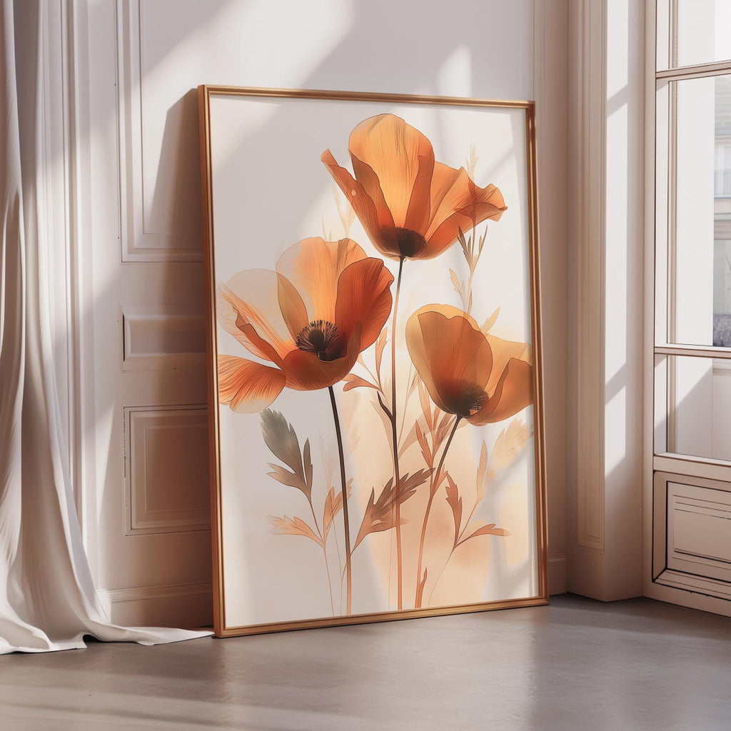 a large framed picture of orange flowers on a white wall.