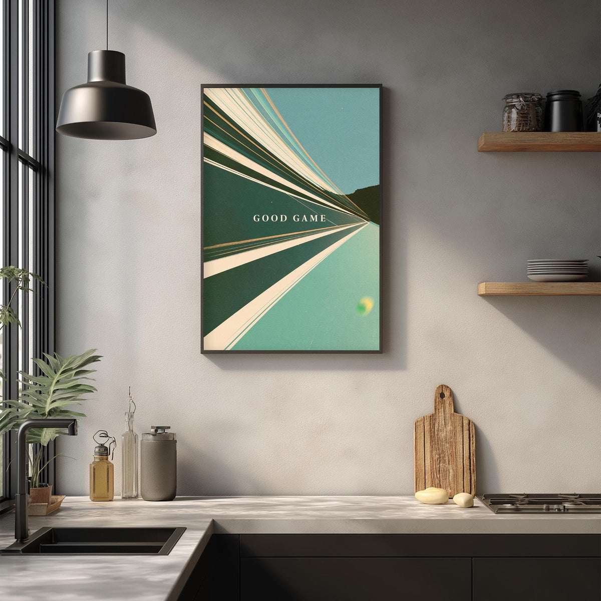 a kitchen counter with a framed poster of a green and white abstract design hanging above it. The poster has the text "GOOD GAME" written on it. The kitchen counter also has various items such as a cutting board, a bottle, and a plant.