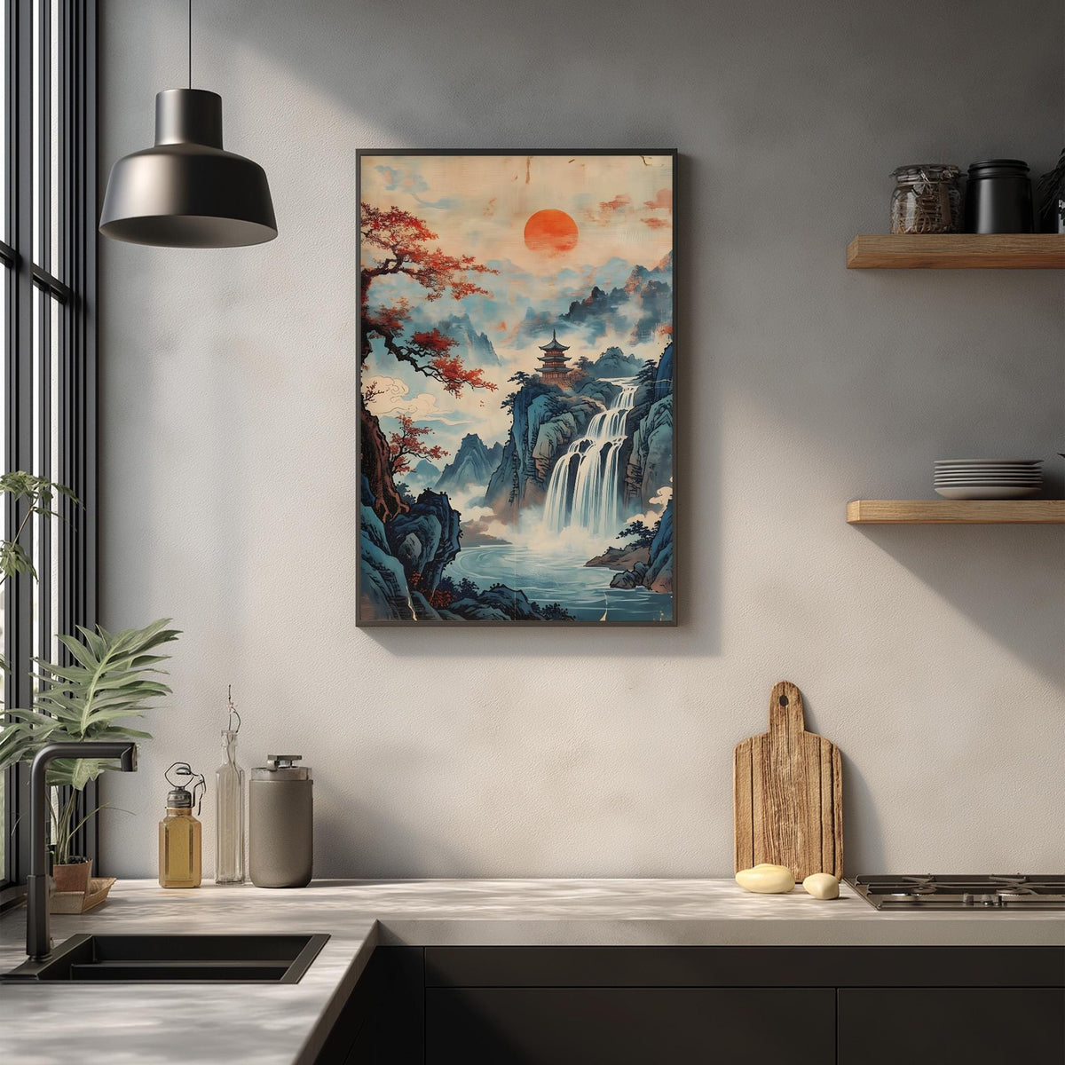 a kitchen counter with a framed painting of a waterfall and mountains hanging on the wall above it. The painting has a warm, orange and blue color scheme, creating a serene and picturesque scene. The kitchen counter also has various items, such as a cutting board, a bottle, and a vase, adding to the overall aesthetic of the space.
