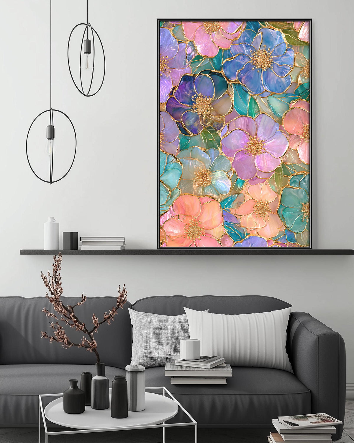 a large, colorful floral print hanging on a wall above a gray couch in a modern living room setting.