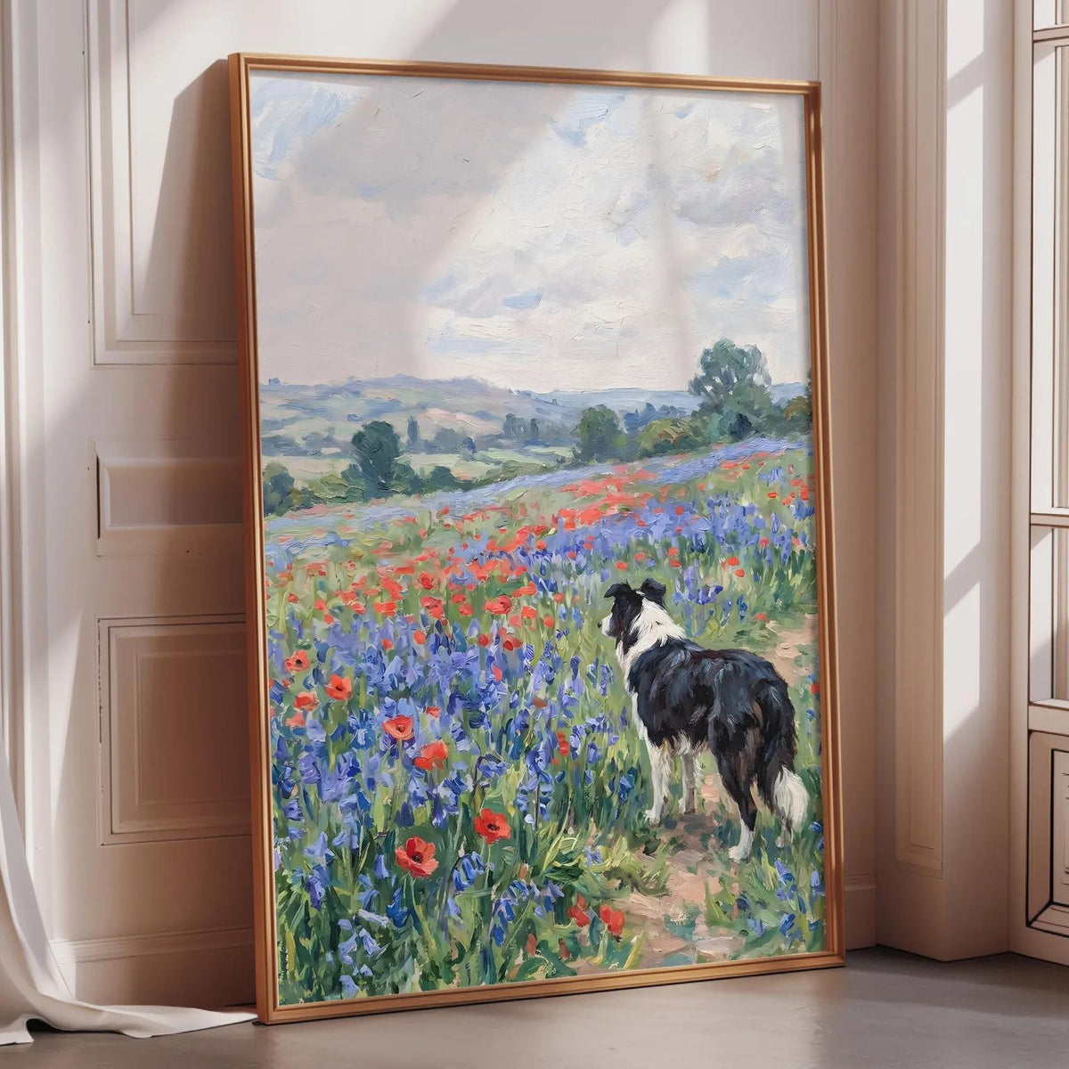 A framed painting depicting a black and white dog standing in a field of colorful flowers, with a picturesque landscape in the background.