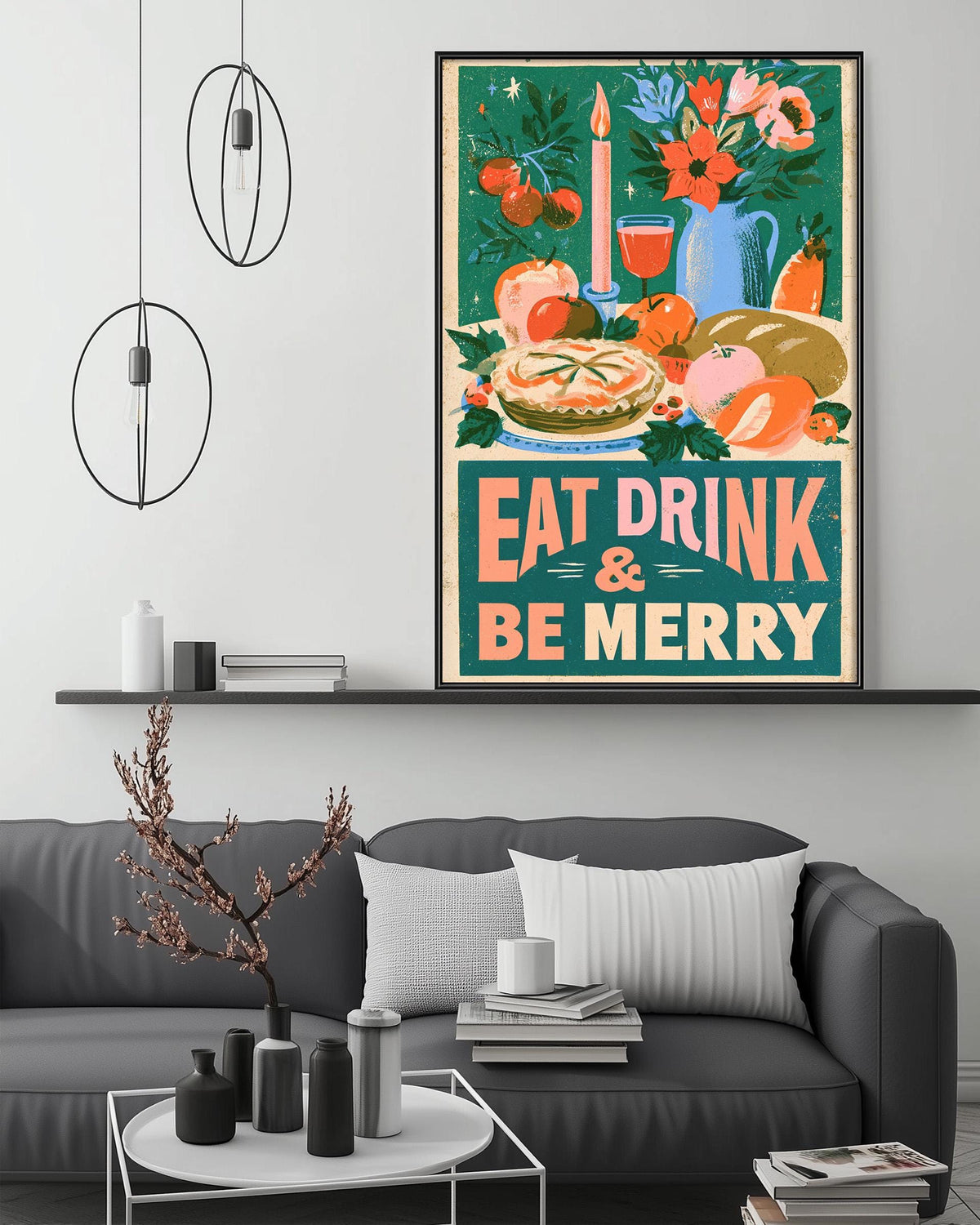 a cozy living room with a gray sofa, a coffee table, and a framed poster on the wall that reads "EAT DRINK & BE MERRY".