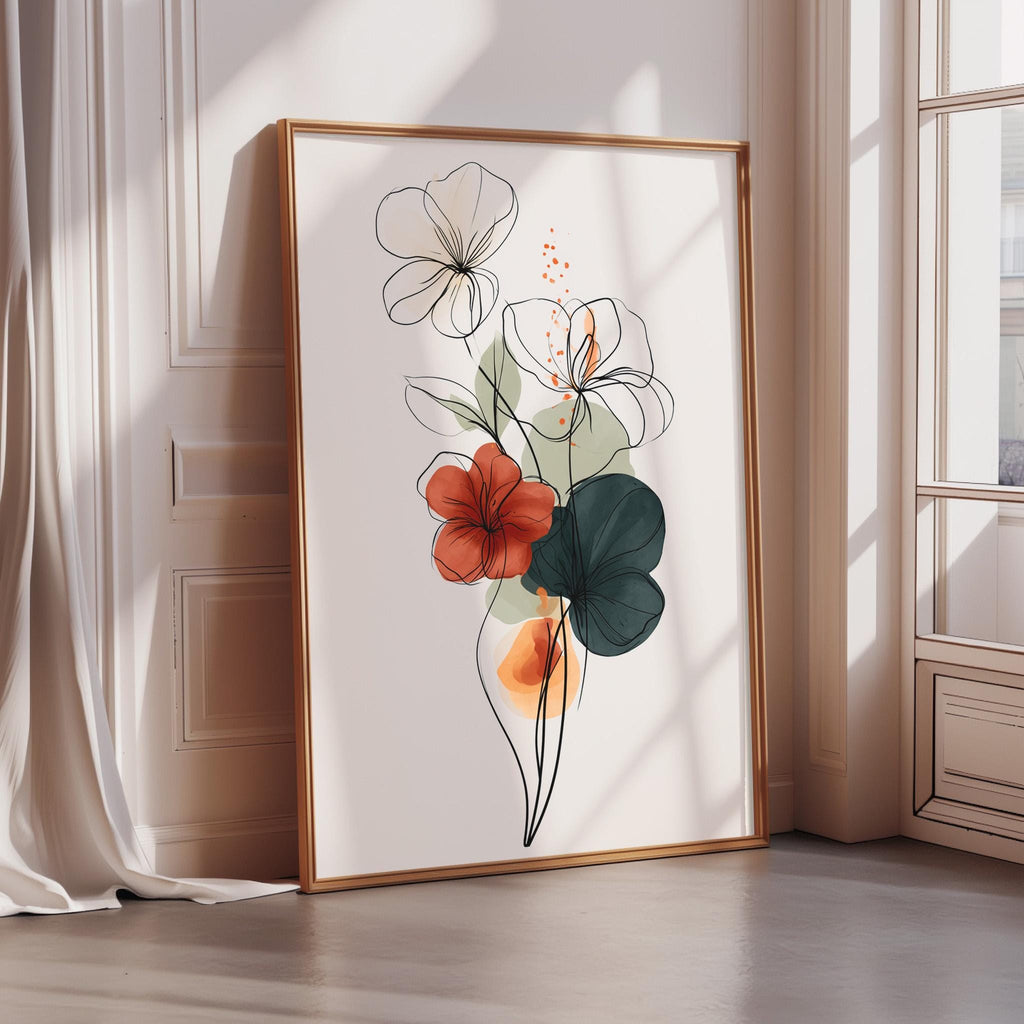 A framed print of a floral design with red and green flowers is displayed on a wall in a room with a window.