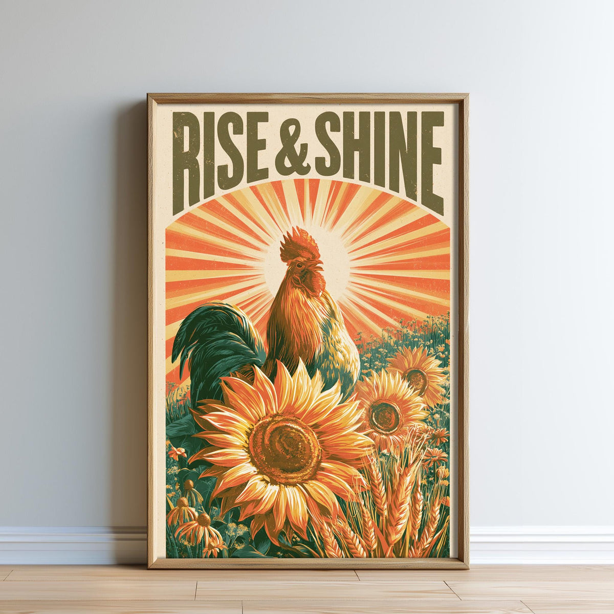 The image is a framed poster with a rooster and sunflowers, along with the text "RISE & SHINE" prominently displayed.