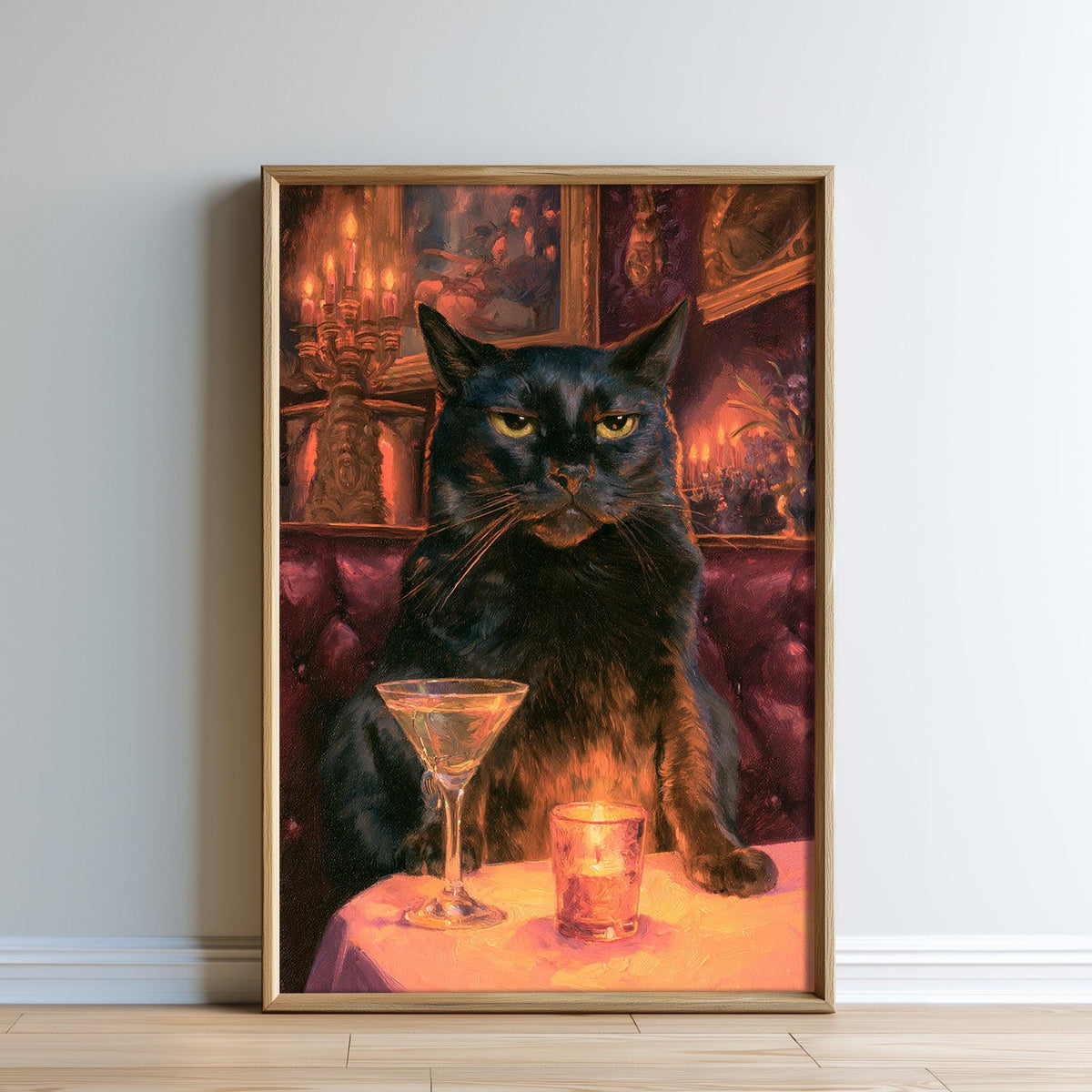 A black cat sitting on a table with a martini glass and a candle in front of it, with a warm, dimly lit background.
