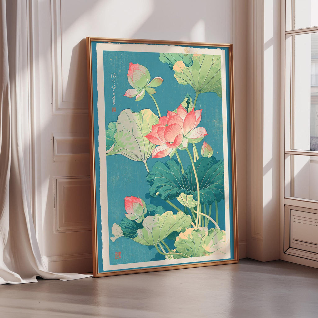 A framed illustration of a lotus flower and lily pads is displayed on a wall in a room with sunlight streaming in from a window.