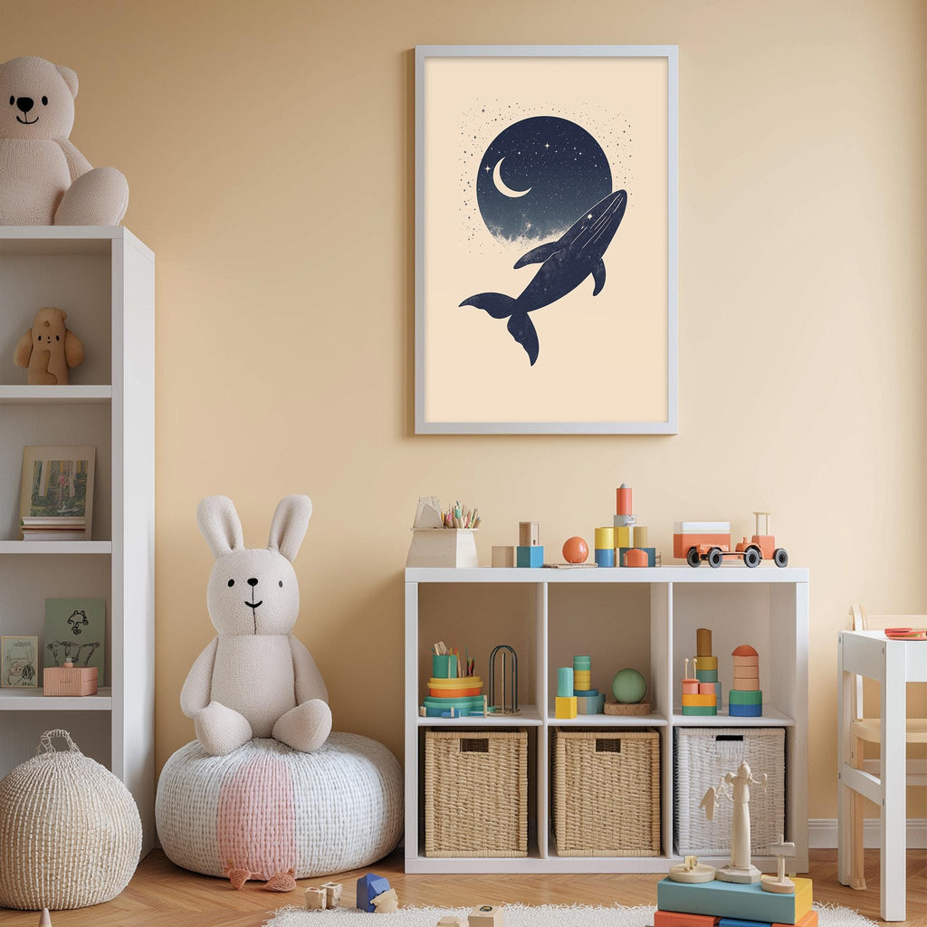 A child's bedroom with a white bookshelf, a stuffed rabbit, a toy train, and a framed artwork of a whale and a crescent moon on the wall.
