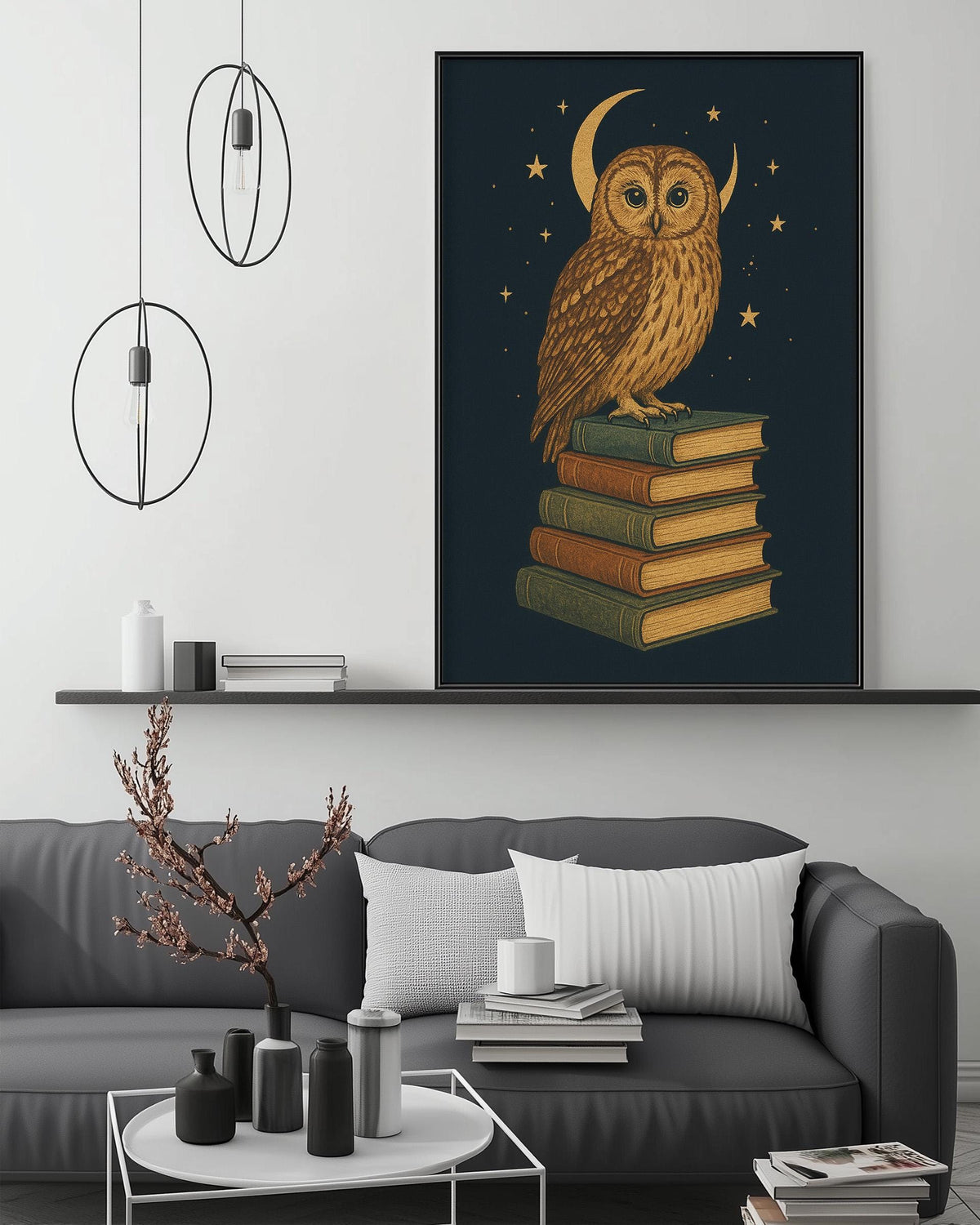 a cozy living room with a gray sofa, a coffee table, and a large framed illustration of an owl perched on a stack of books. The room has a minimalist and modern design, with a black and white color scheme and a few decorative elements such as a potted plant and a vase.
