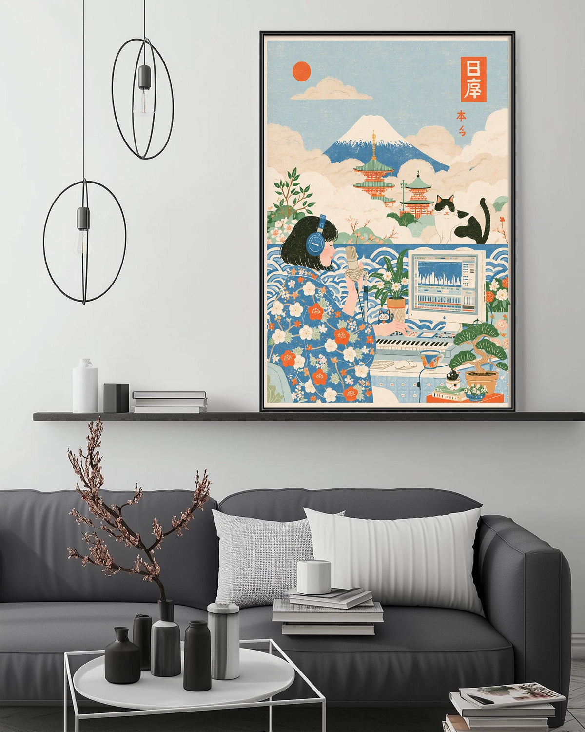 a living room with a gray sofa, a coffee table, and a large framed poster of a woman in traditional Japanese clothing. The poster depicts a woman in a blue dress with a cat, surrounded by various objects such as a vase, a book, and a television. The poster is hung on the wall above the sofa, creating a visually appealing and harmonious space.
