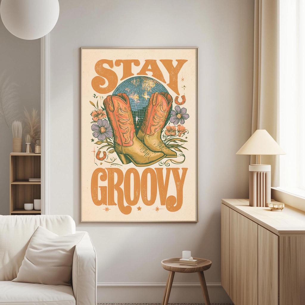 a poster with the text "STAY GROOVY" and an illustration of a pair of cowboy boots, a disco ball, and flowers.