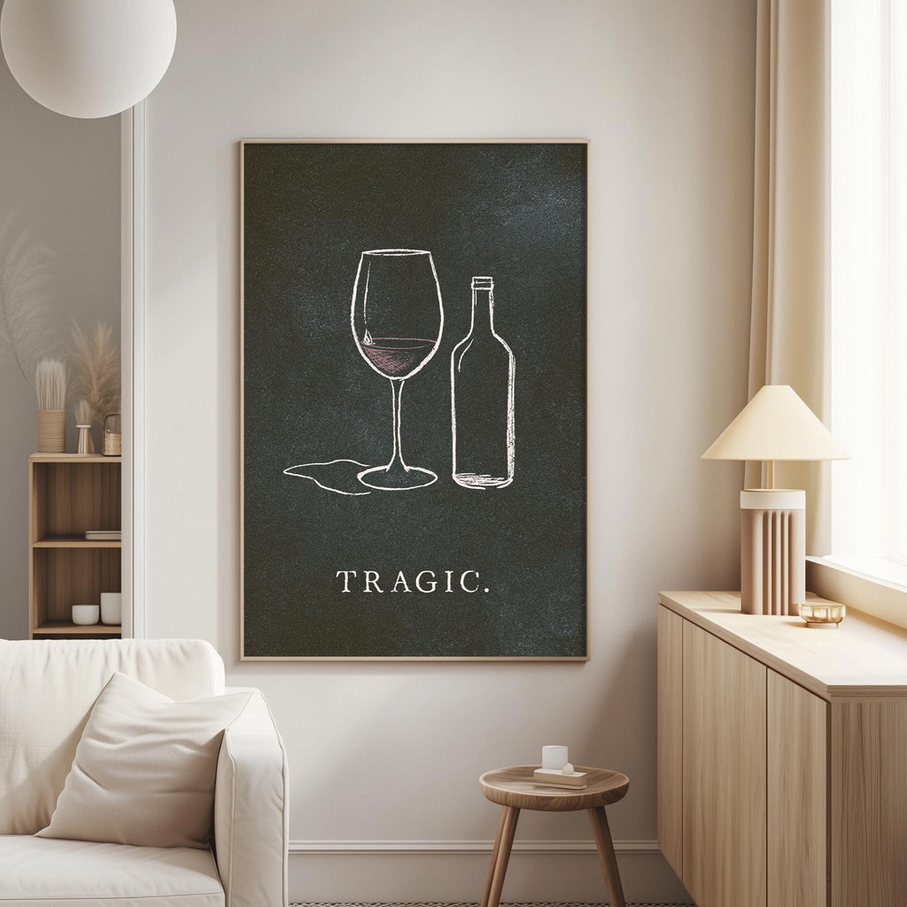 a living room with a white sofa, a wooden side table, and a framed artwork depicting a wine glass and a bottle on the wall.