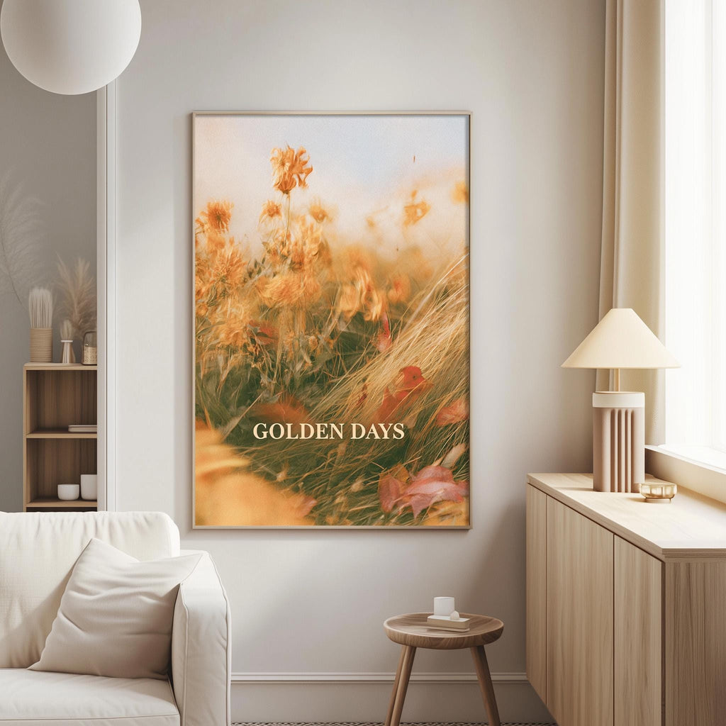 a large framed picture of a field of flowers hanging on a wall in a living room.