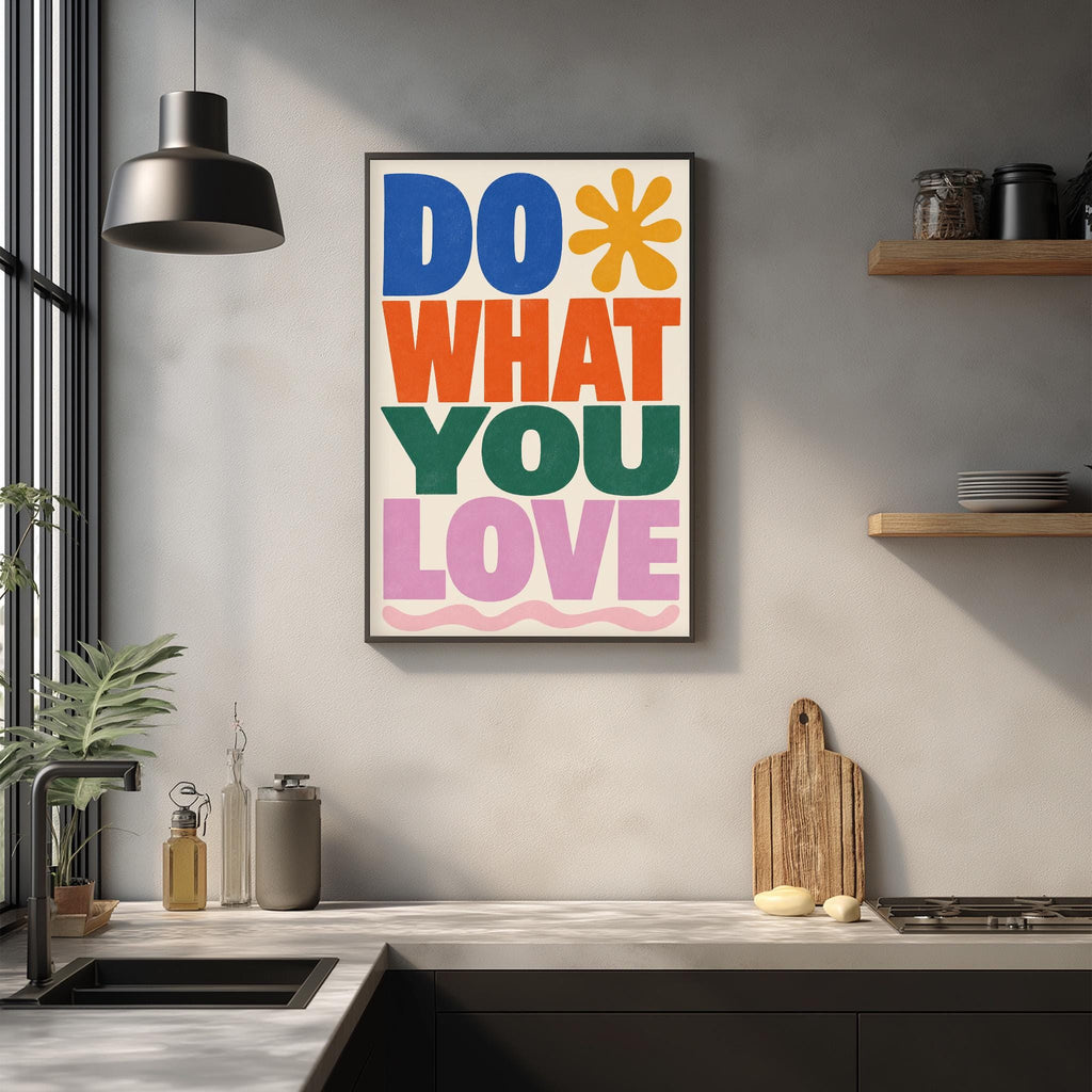 a kitchen counter with a framed poster that reads "DO WHAT YOU LOVE" above it. The poster has a colorful design with various shapes and colors.