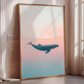 a large framed poster of a whale against a gradient background, with a warm and soothing color palette.