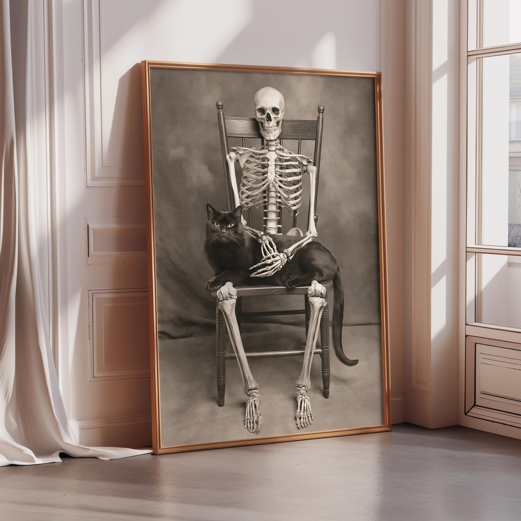 A black and white photograph of a skeleton sitting in a chair, with a cat resting on its lap.