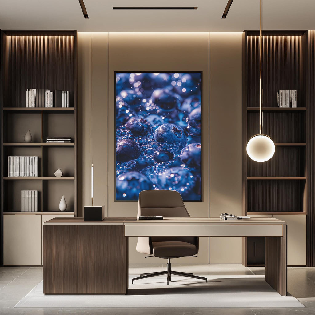 a modern and minimalist office space with a large framed artwork depicting blueberries on the wall. The office has a wooden desk, a comfortable-looking chair, and a pendant light above the desk. The overall design and decor create a clean and professional atmosphere.
