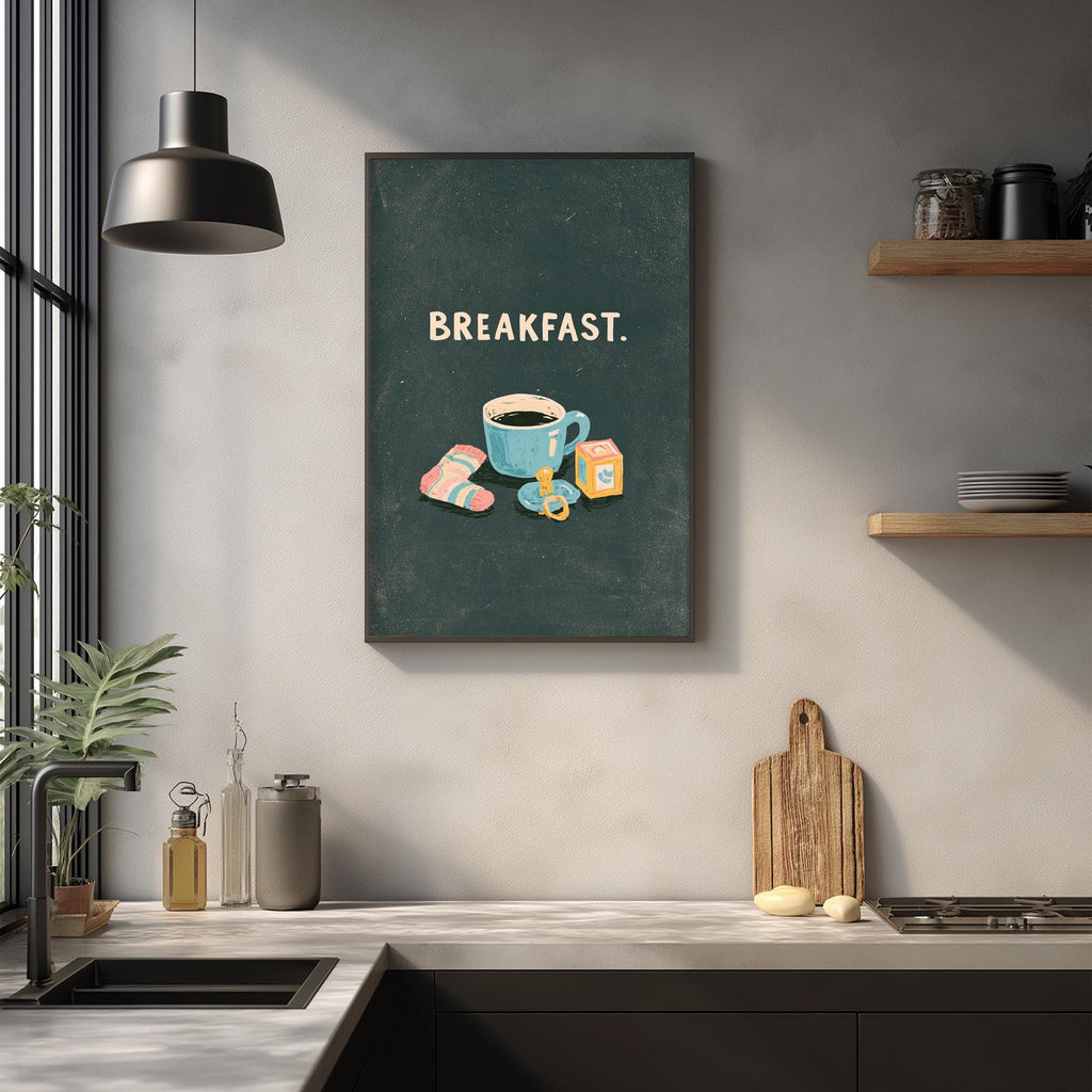 a kitchen counter with various items, including a coffee mug, a cutting board, and a plant, along with a framed poster that says "BREAKFAST."