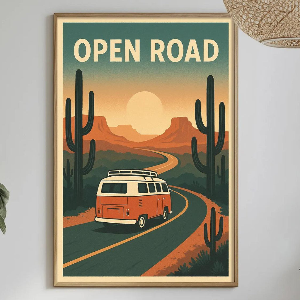 a framed poster of a red van traveling down a road through a desert landscape, with the text "OPEN ROAD" prominently displayed.