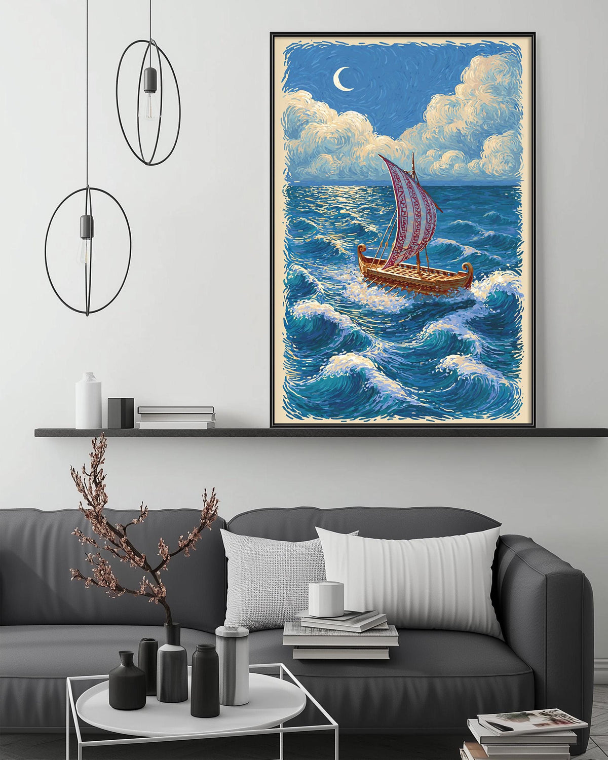 a large painting of a sailboat on the ocean, hanging on a wall above a gray couch with a coffee table in front of it.